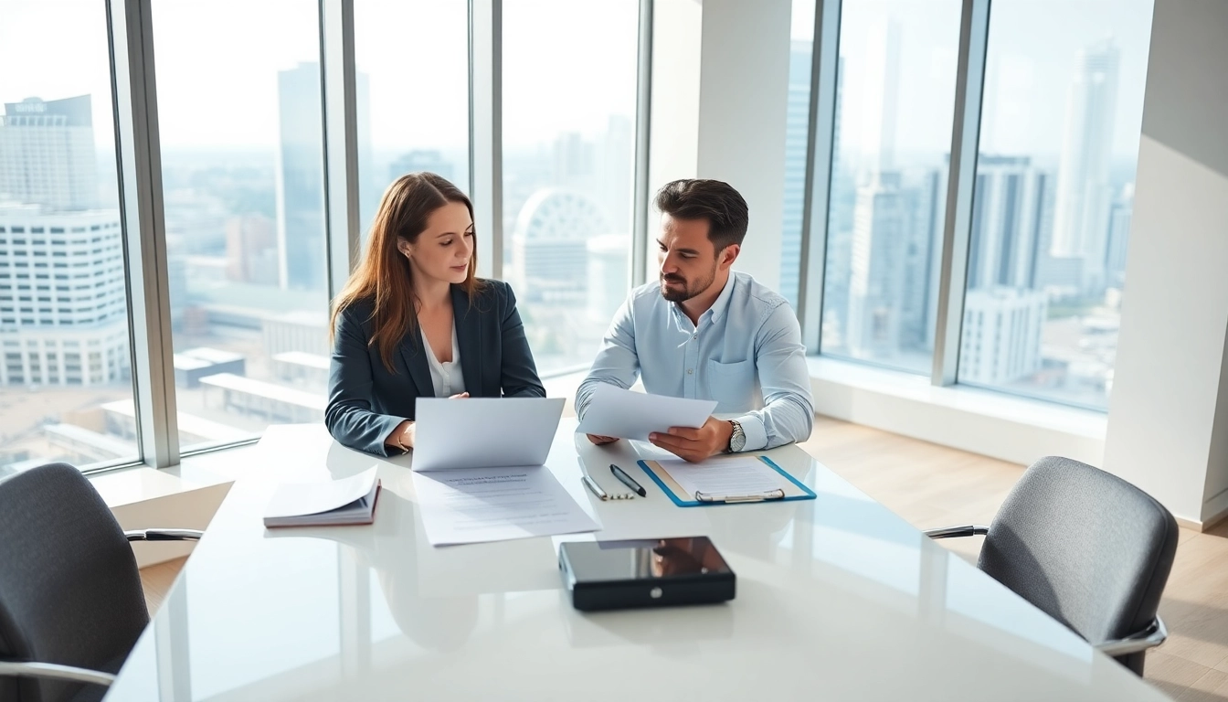 Couple reviewing Family Law Financial Agreements in a bright office setting.